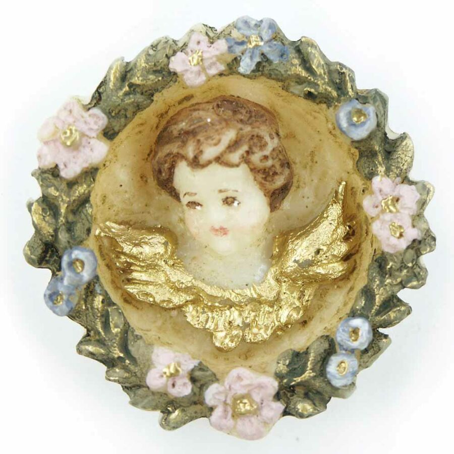 Medaillion mit Engelkopf in einer Blütenranke