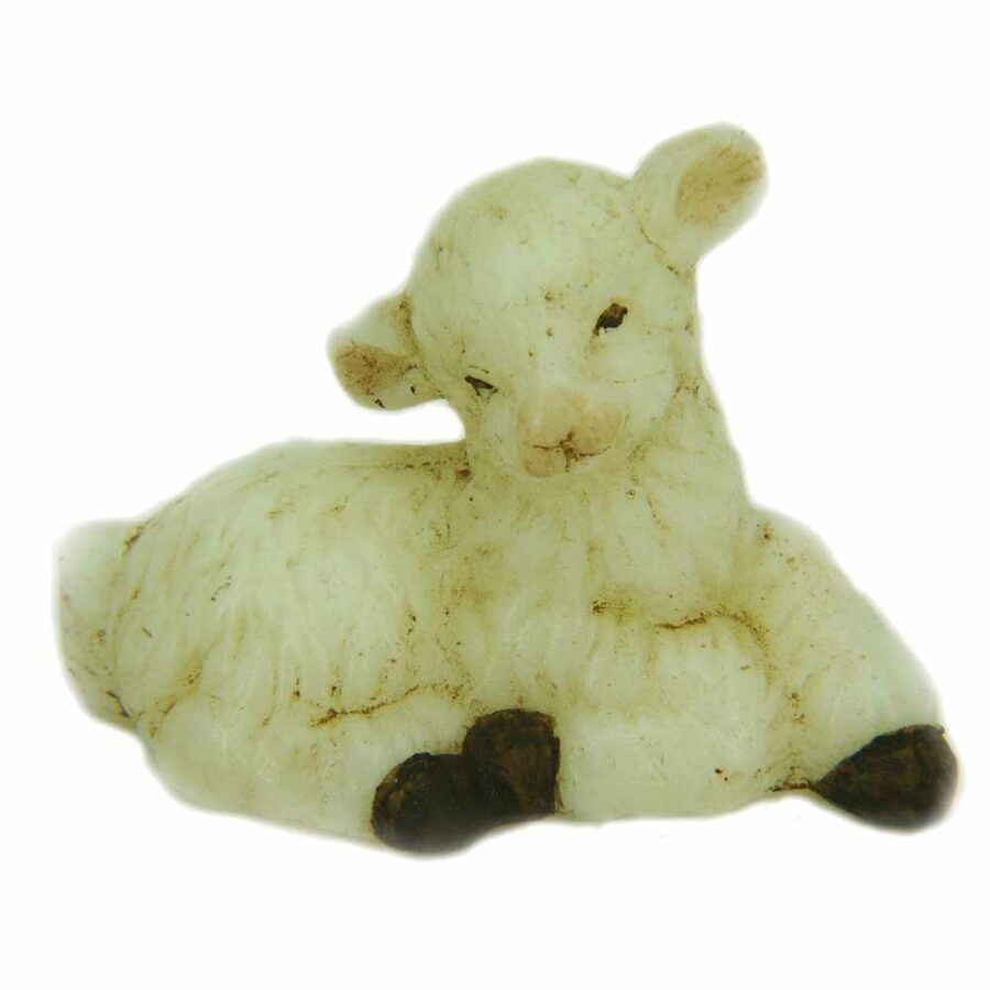 Kindliches Schaf liegend in Wachs